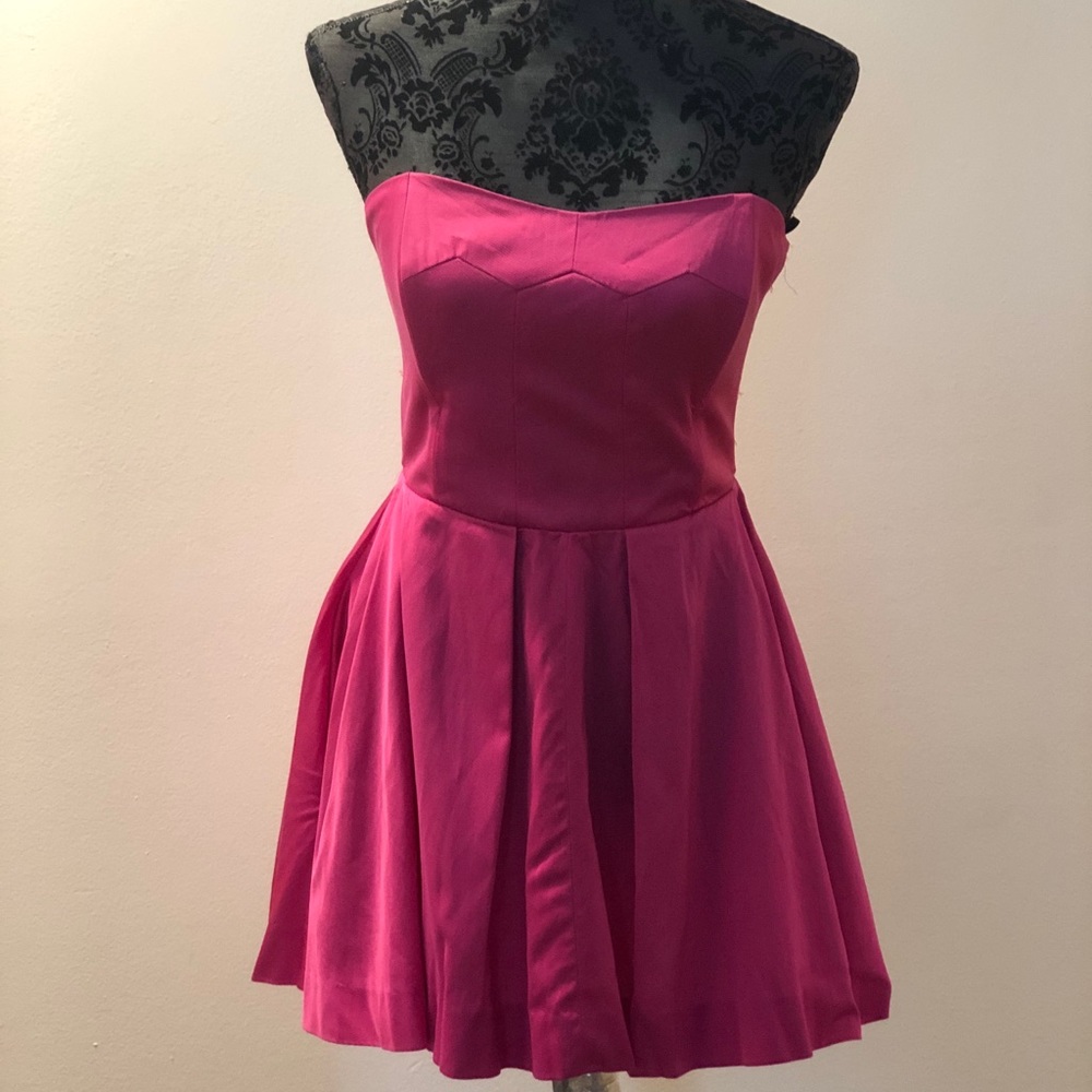 Pink strapless dress from “French Connection”